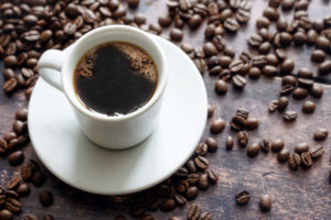 coffee-cup-on-a-saucer-with-coffee-beans